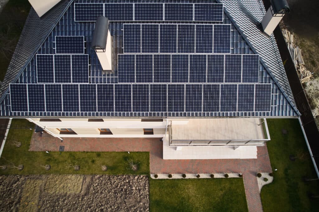 Want to save thousands on your energy bills? Here's how many solar panels you need for a 2000 sq ft house! | DroneQuote